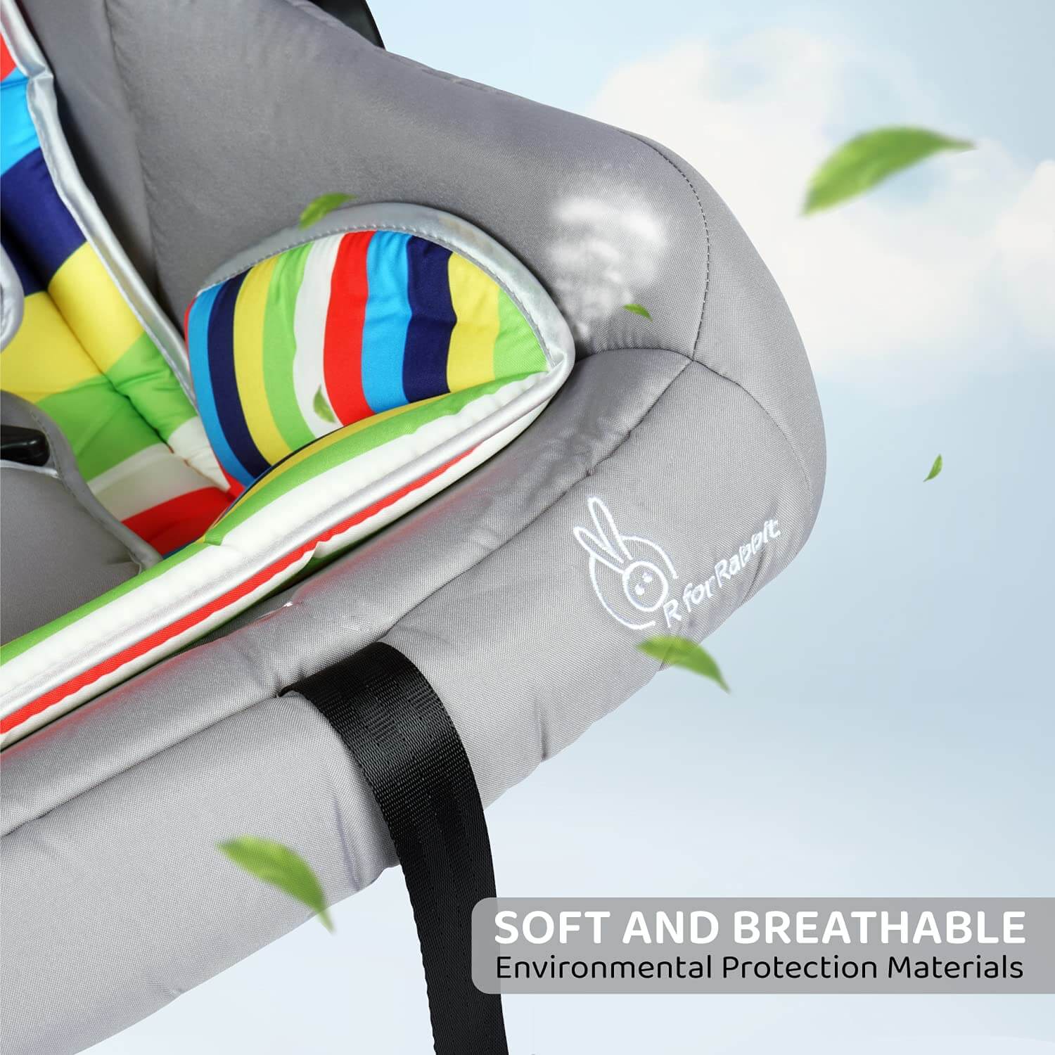 R for Rabbit Picaboo 4-in-1 multi-purpose baby carry cot in grey with a vibrant multi-color striped cushion, functioning as an infant car seat, portable carrier, rocker, and feeding chair. Ideal for newborns and infants on usmile.toys. www.usmile.toys